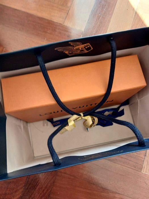 Pochette Louis Vuitton autêntica com talão de compra