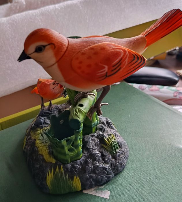 Peça decorativa com pássaros