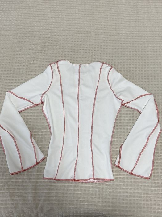 Кофтинка з кльош рукавами