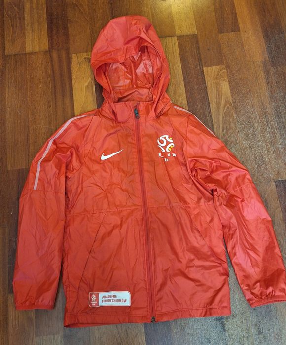 Ortalion kurtka,cienka sportowa Nike 128-137 Akademia Młodych Orłów