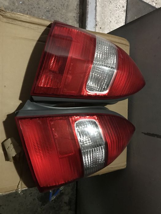 оптика Mazda 323f bj