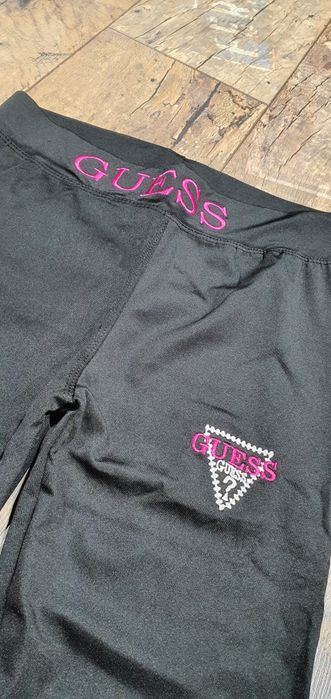 Czarne legginsy damskie premium logo neon M