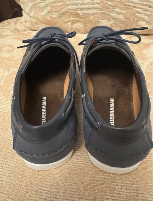 Sapatos de vela da quebramar