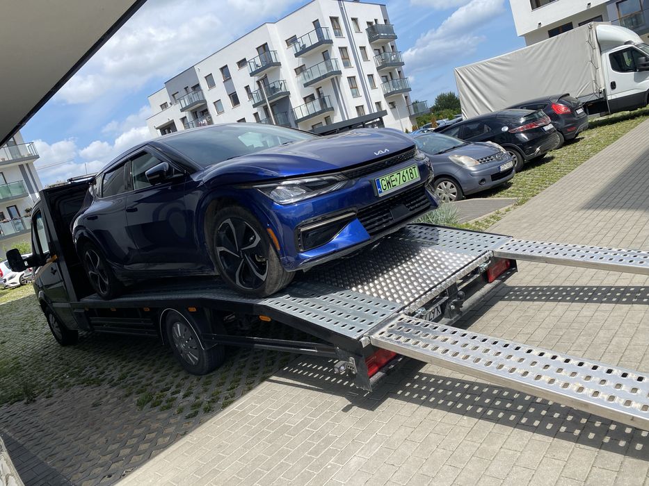 POMOC DROGOWA Laweta Przewóz pojazdów i maszyn Transport 24/7 Tanio