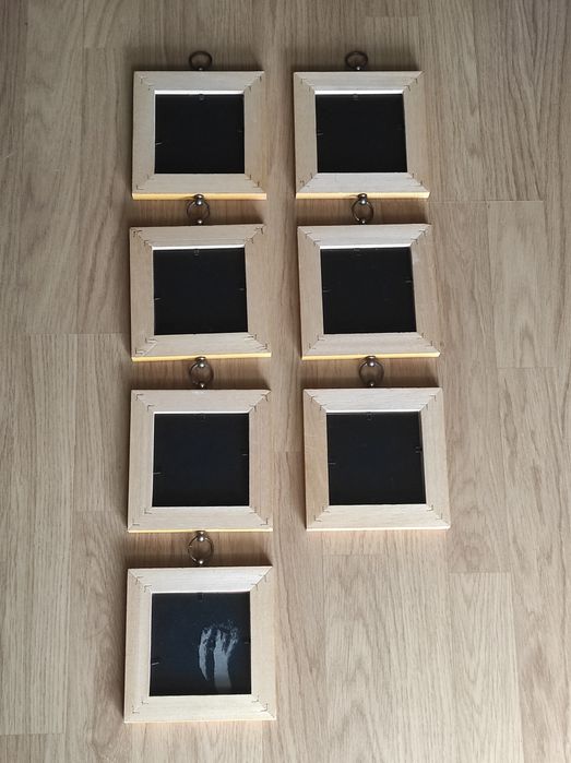 Molduras de parede em madeira para fotos