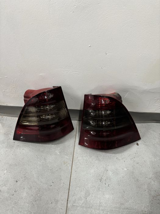 Lampy tył tylne mercedes ml w163 lampa prawa lewa przyciemniane lampa