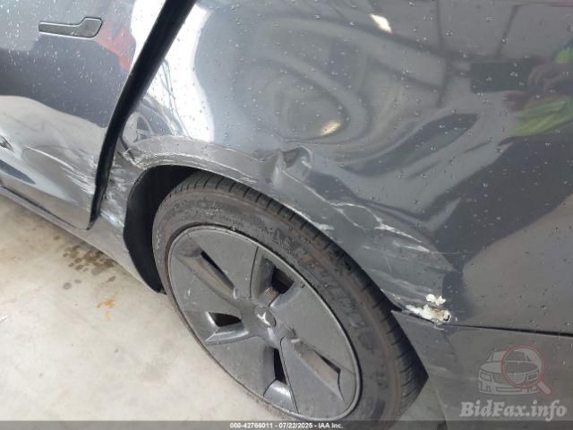 Тесла модел 3 2023 рік