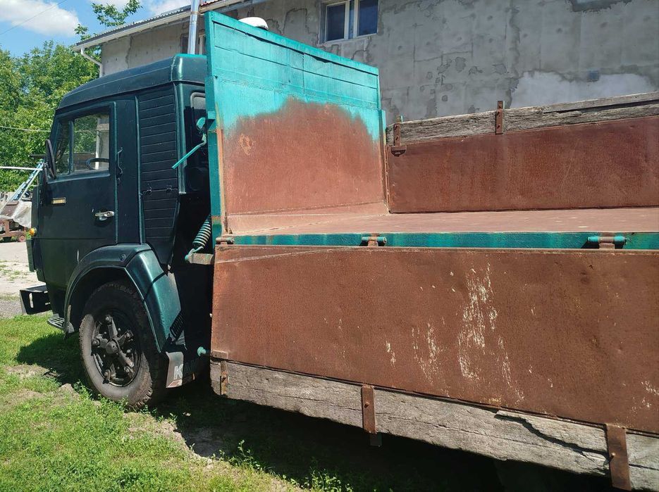 Камаз колхозник( на бока) і 2 прицепа