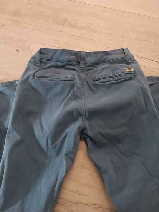 Spodnie młodzieżowe Lee Cooper rozm.28/32 jak nowe