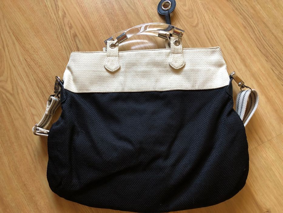 Mala preta e pérola