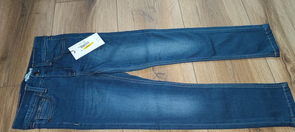 Spodnie 128 nowe jeansowe dziewczęce nr it niebieskie