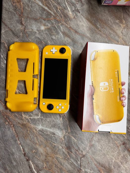 Продам обменяю Nintendo Switch Lite + игры