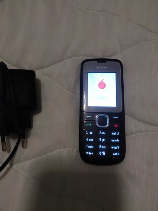 Nokia c1-01, a 100% com carregador