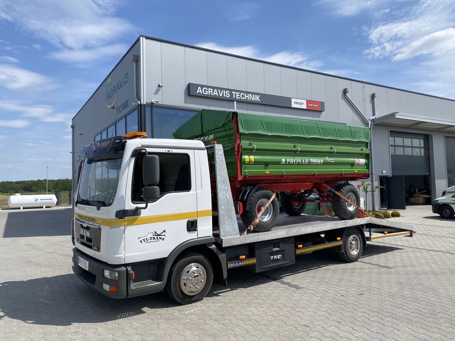 Usługi transportowe maszyn rolniczych i budowlanych laweta transport