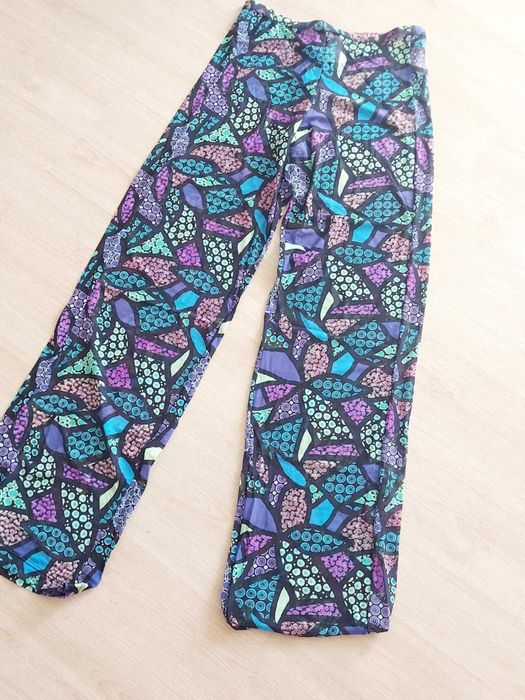 Calça rede semi-transparente