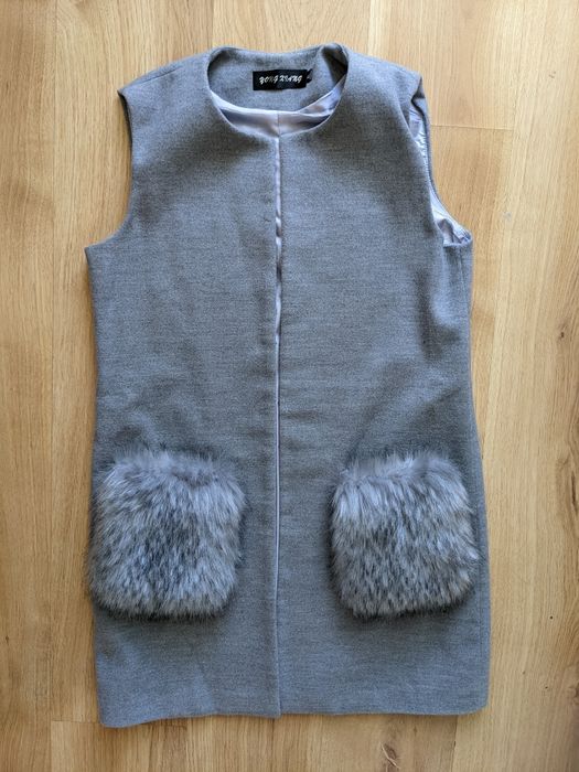 Жилетка, безрукавка