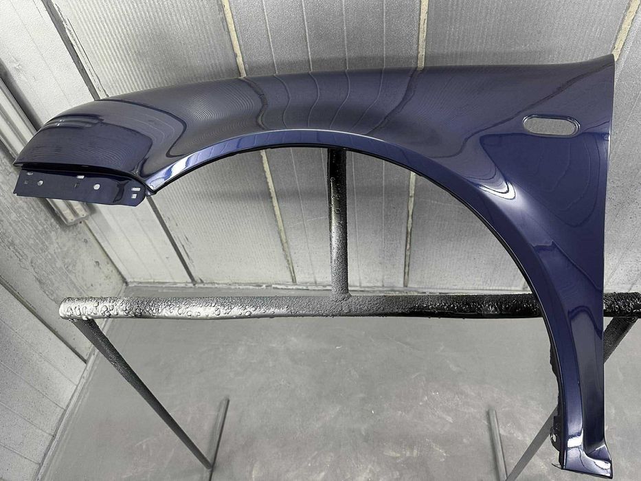 BŁOTNIK Volkswagen Bora 98-05 KOLOR LB5N NOWY