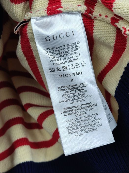 Beżowy sweter Gucci w czerwone paski