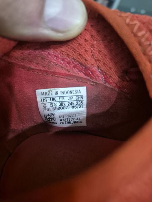 Chuteira adidas vermelha