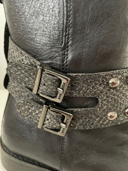 Botas pretas cano alto