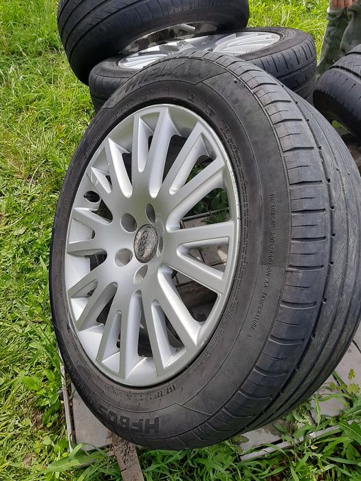 Продам титанові диски+літня гума Audi 225/55 R17 .