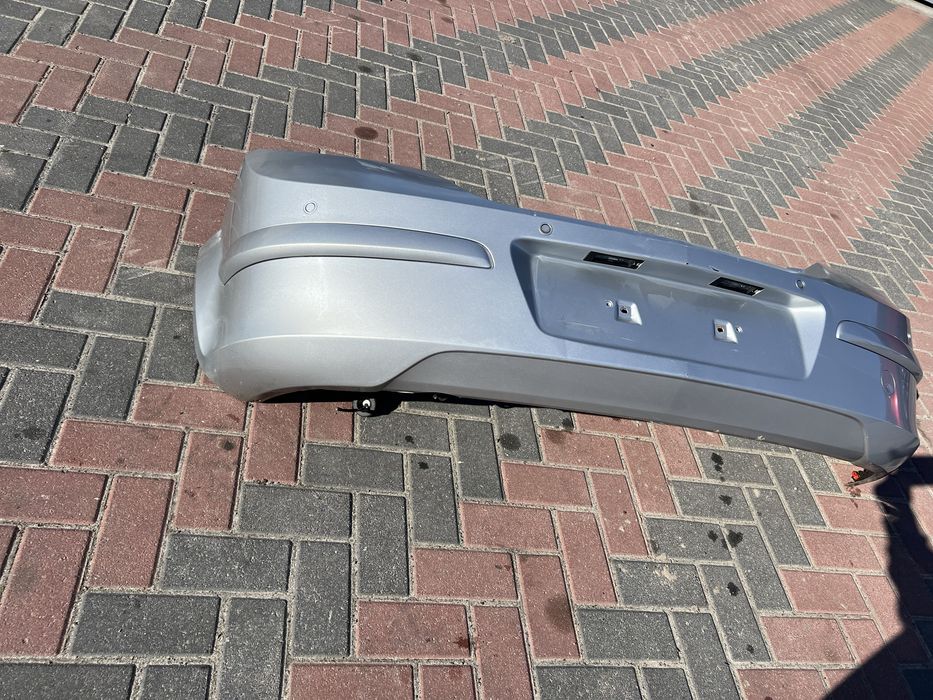 Задній бампер Опель Астра Н