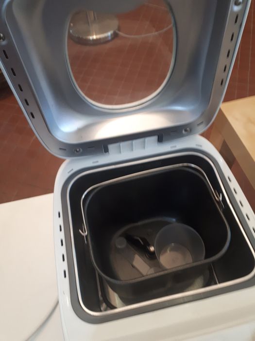 Maquina cozer pão .