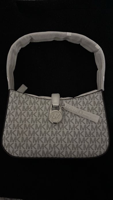 Bolsa Michael Kors como nova