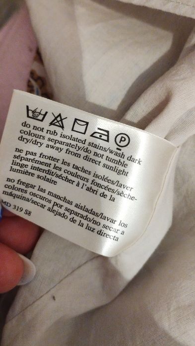 Bawełniano-jedwabna sukienka we wzór paisley marki Laura Ashley.