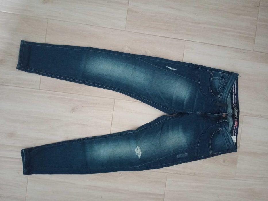 Nowe spodnie jeansowe damskie 36