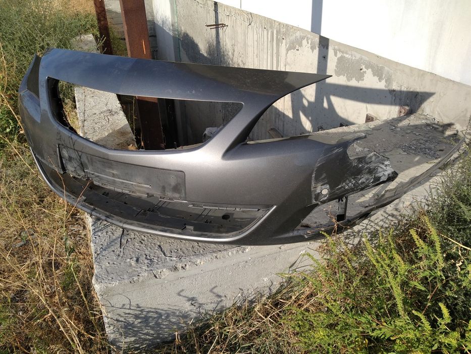 Бампер під ремонт Opel Astra J темно сірий колір Z177