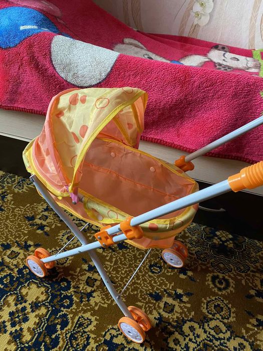 Дитяча коляска для ляльок