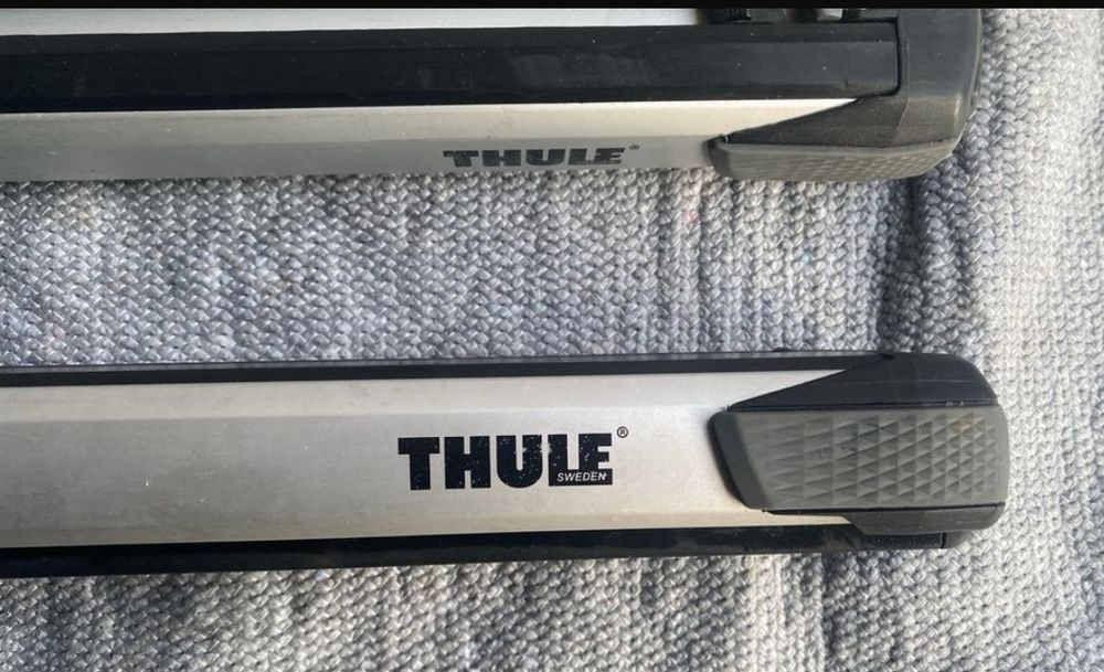 Thule Slidebar аеродинамічні поперечини з механізмом висування.