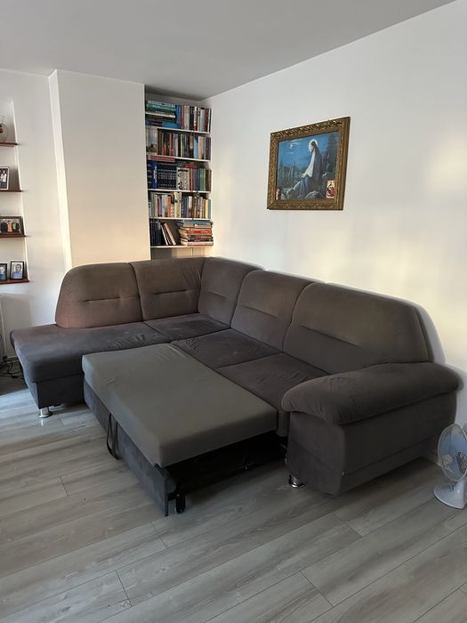Sofa narożna z funkcją spania i pojemnikiem