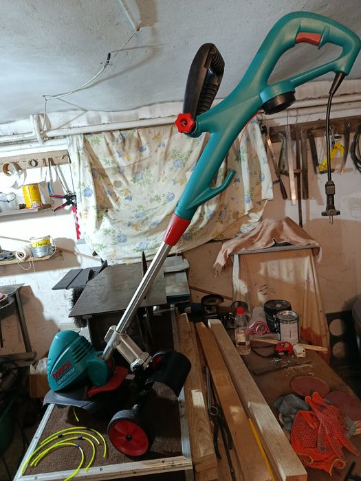 Тример коса bosch art 26 combitrim з колесами і запасними жилками