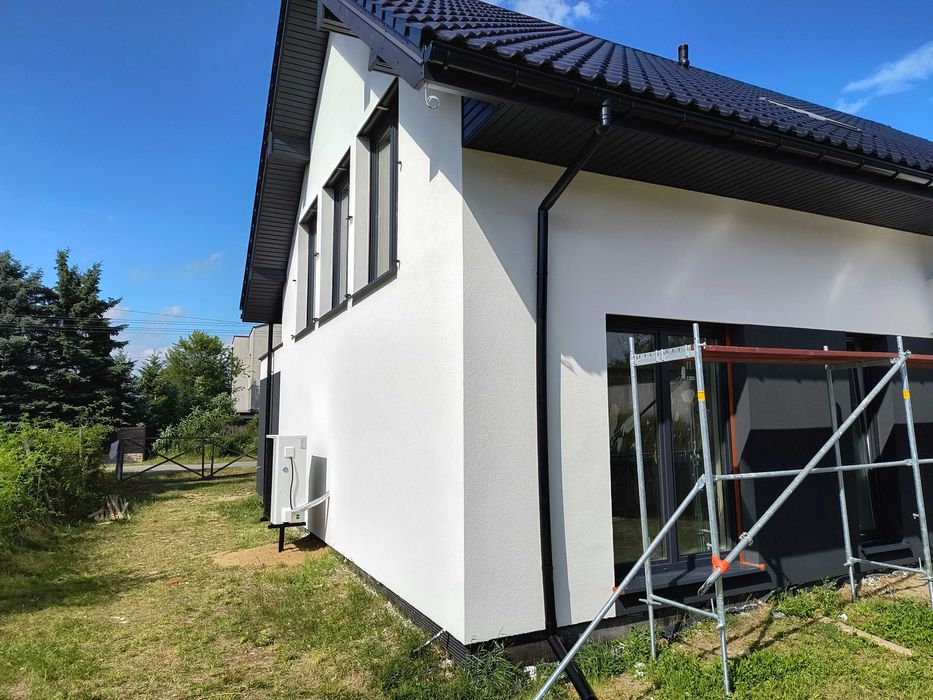 Ocieplenia zewnętrzne elewacje termomodernizacja styropian wełna tynki