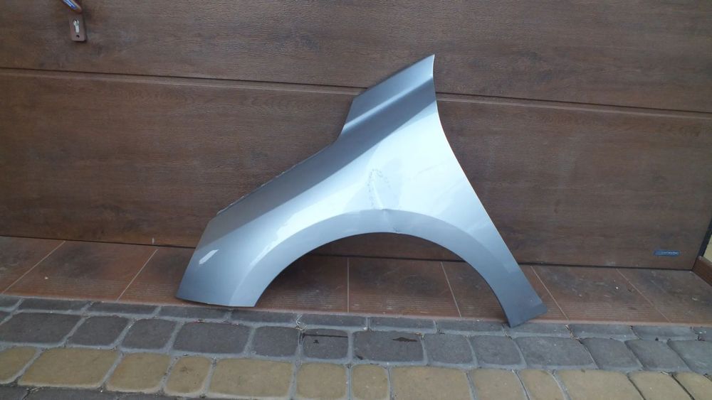 Błotnik przedni lewy Opel Corsa F