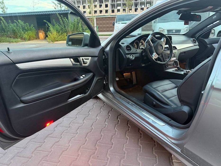 Mercedes-Benz C-Class 2014 VIN WDDGJ4HB2FG371207 фото оголошення 2 з 15