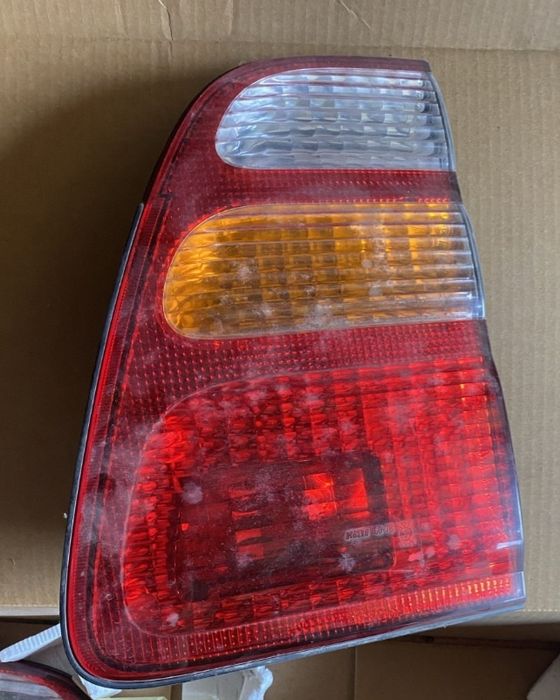 Фонари задні оригінал Toyota Land Cruiser 100 1998-2005