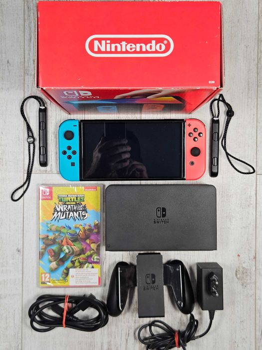 Nintendo Switch OLED Neon – idealny ekran, pudełko + gra TMNT – pełny zestaw