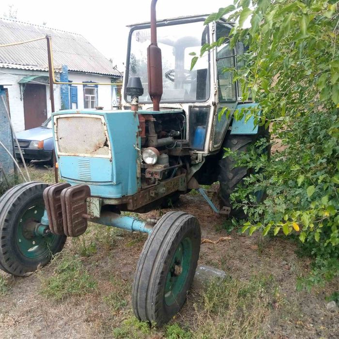 Трактор ЮМЗ, плуг та культиватор