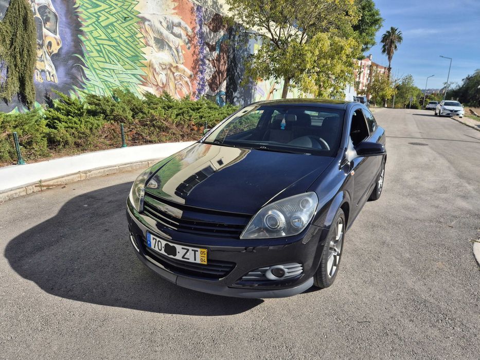 Opel Astra h GTC 1.9cdti — photo 2