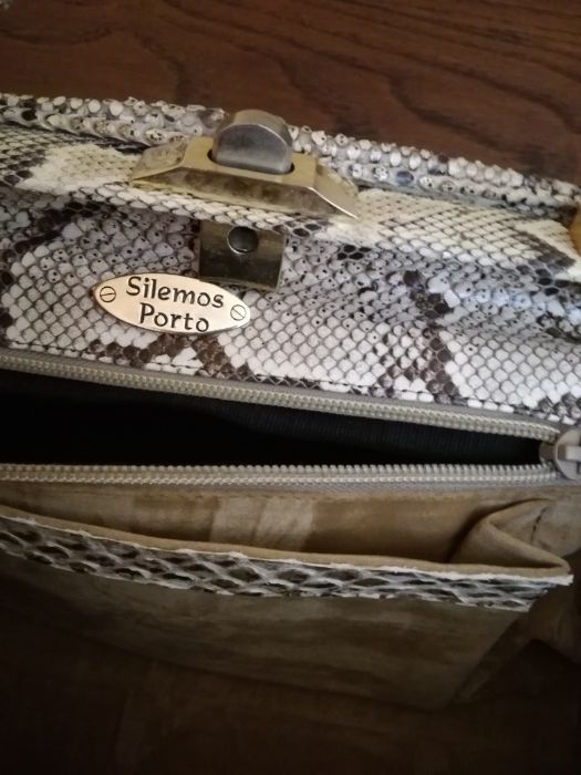 Vendo Mala ou carteira em pele de cobra