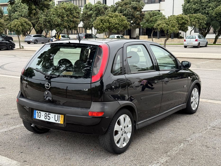 Opel corsa C Enjoy 1.2 gasolina c/teto de abrir