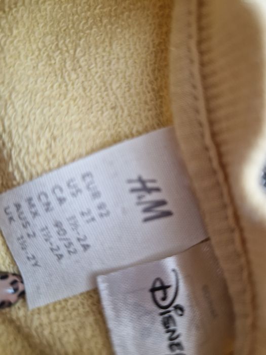 Żółta bluza wkładana przez głowę h&m pluto