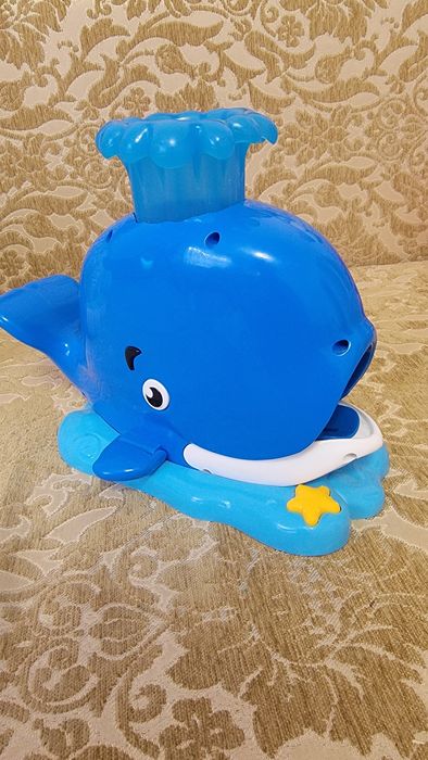 Музичний кит який стріляє  шаріками