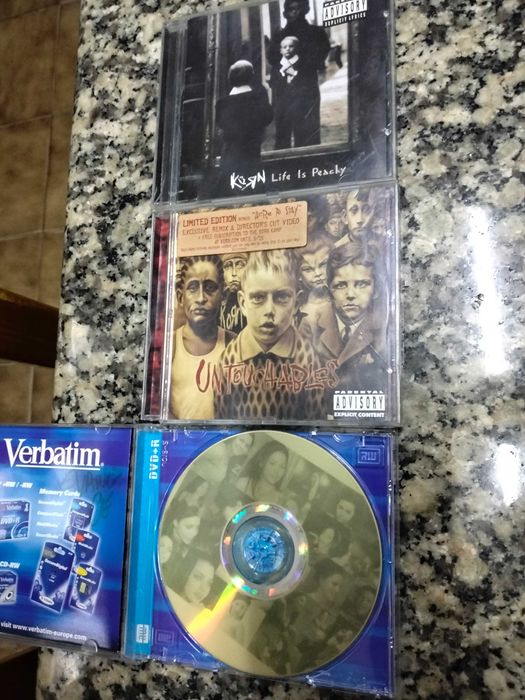 CDs musica Korn Evanescence sistem of merci entre outros