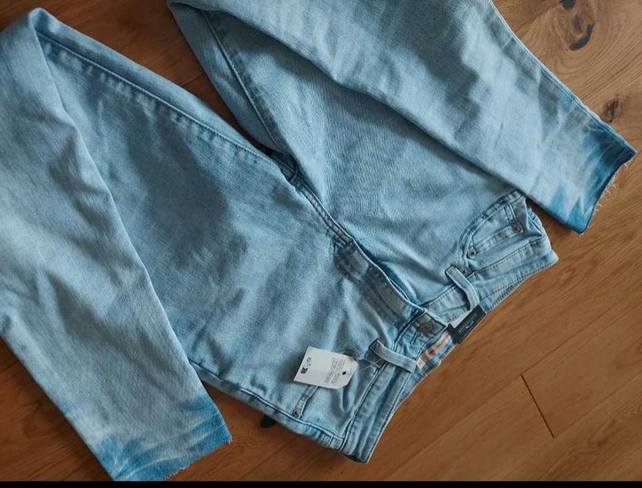 Damskie nowe spodnie levis model 721 high rise skinny 28x30
