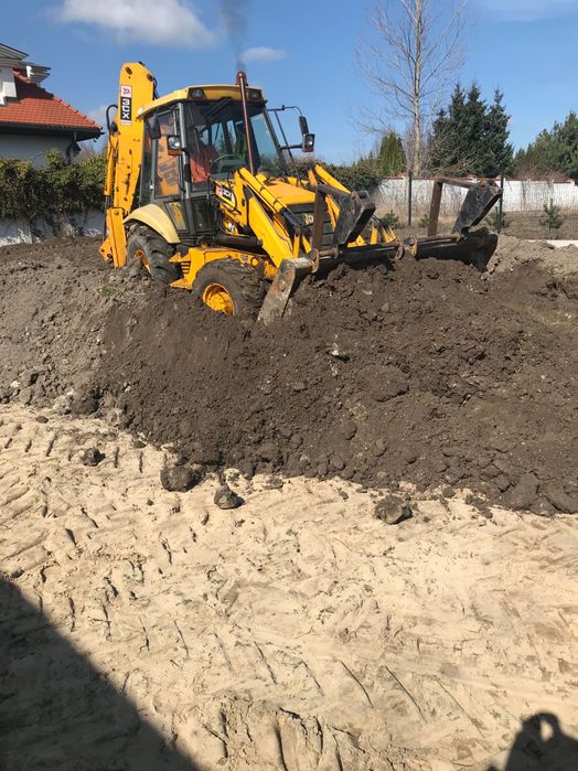Usługi koparko-ładowarką,koparką kołową,ziemia,piach,wyburzenia