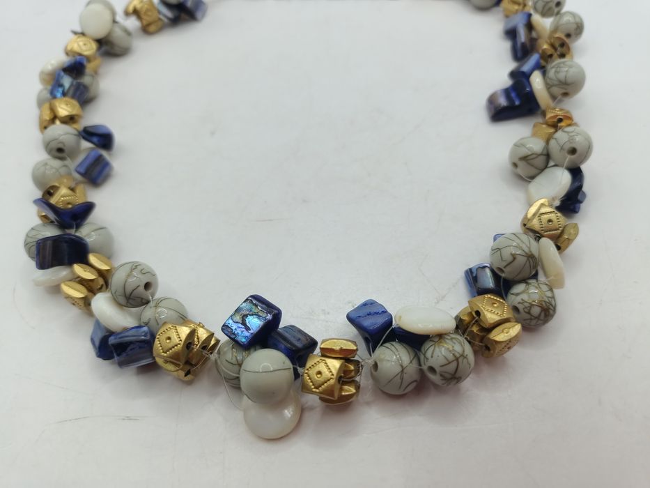 Korale naszyjnik różne elementy w kolorach złota i srebra
Bardzo dobry